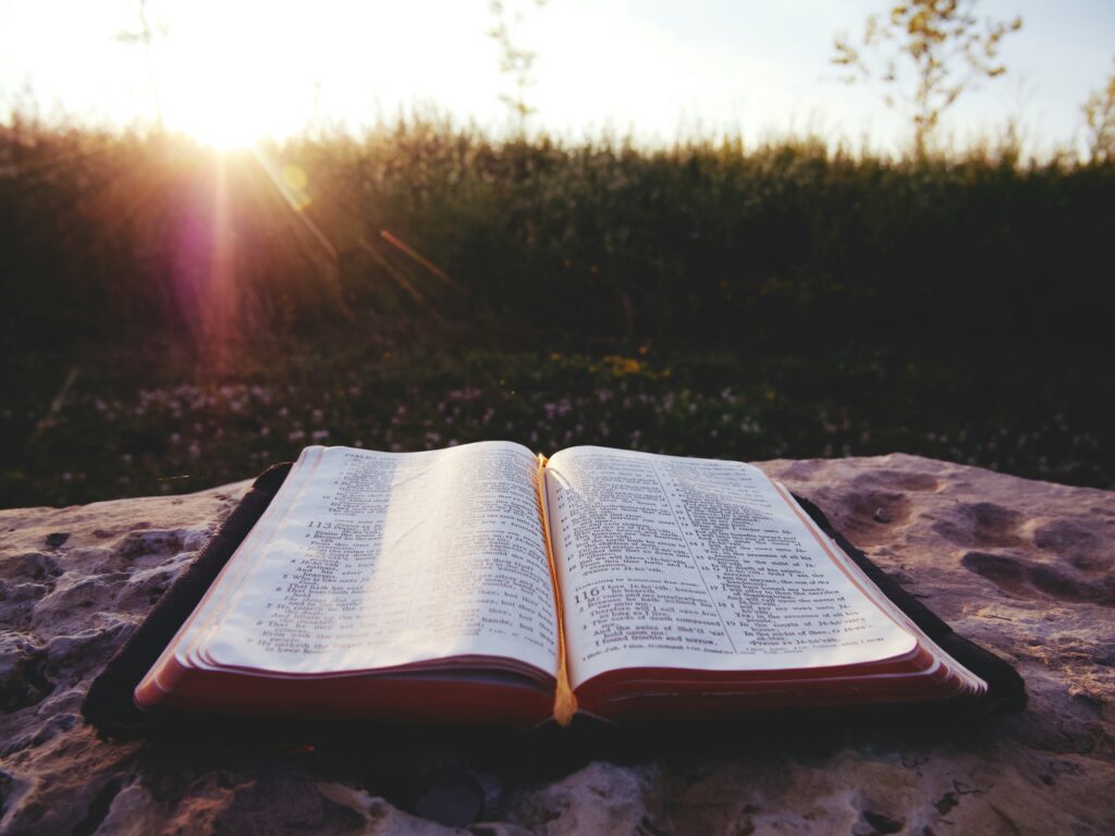 bible verses about healing showing an open Bible with highlighted scriptures and a cross representing the most comforting healing scriptures for emotional physical and spiritual recovery