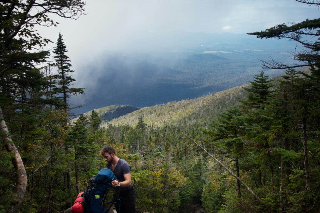upstate new york hikes showing trail through colorful fall foliage representing upstate new york hikes best fall hikes upstate new york hiking upstate ny fall foliage hikes and best hikes in upstate new york