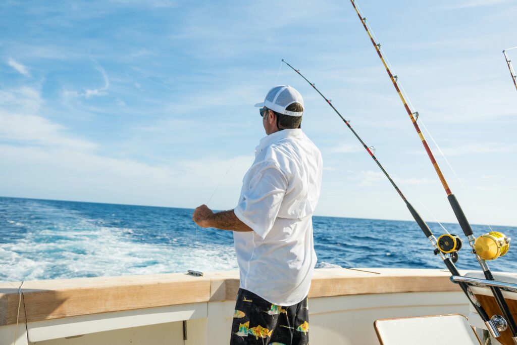 best boat and fishing accessories showing a fishing boat equipped with a trolling motor rod holders and sun shade representing popular boat upgrades
