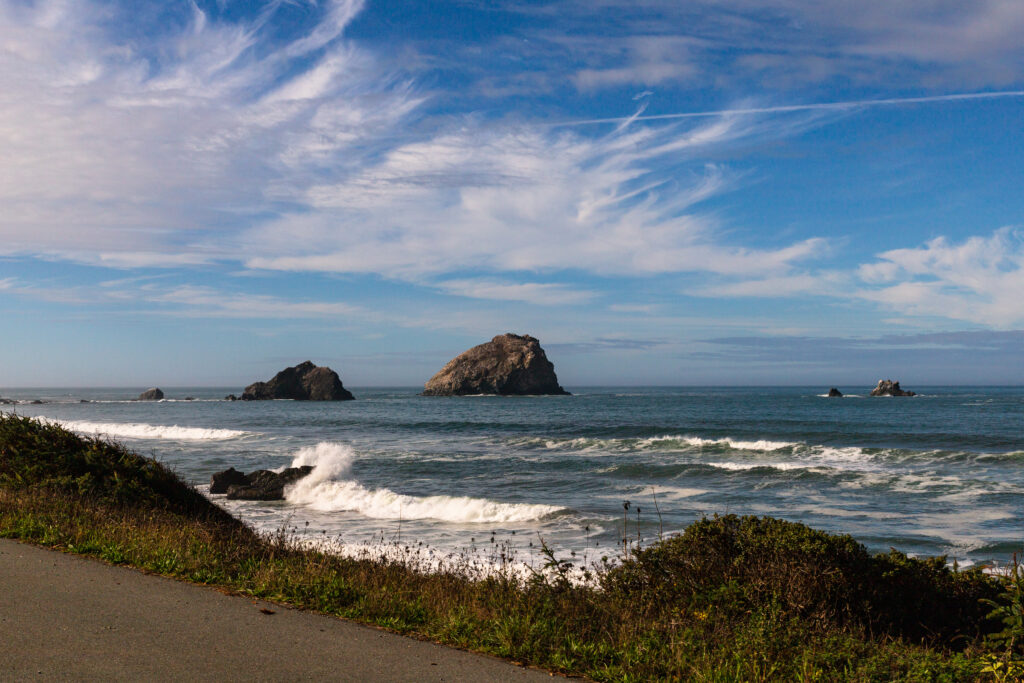 portland to cannon beach showing Haystack Rock and Oregon Coast scenery representing Portland to Cannon Beach day trip drive distance how far is Cannon Beach from Portland Ecola State Park things to do Cannon Beach itinerary and is Cannon Beach worth visiting