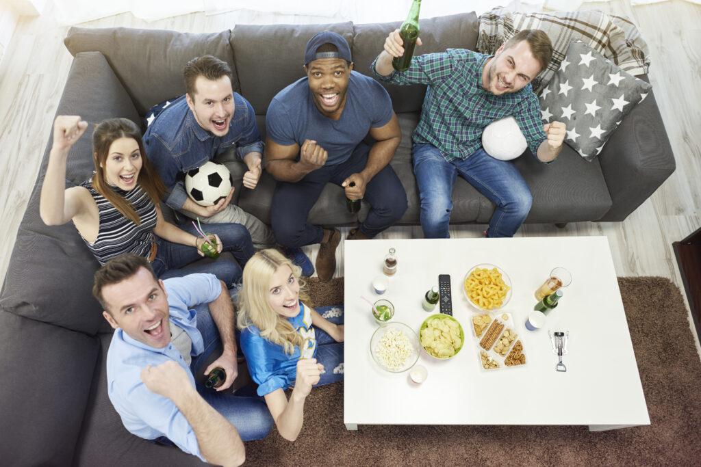 how to watch world cup 2026 free showing a TV and streaming apps representing how to watch World Cup 2026 free streaming options USA UK BBC iPlayer ITVX Fox Sports Fox One Telemundo Peacock and cable-free options