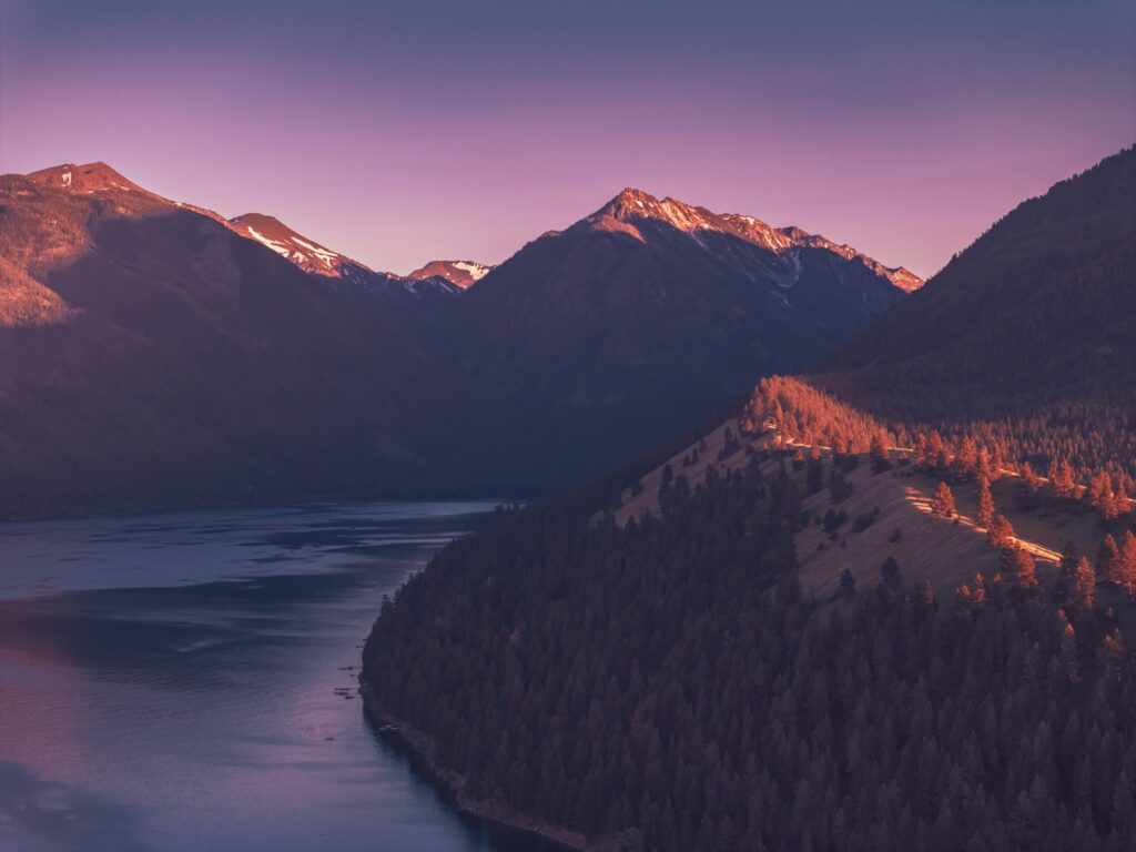 wallowa mountains showing snow capped peaks above Wallowa Lake representing wallowa mountains wallowa lake oregon wallowa mountains oregon eagle cap wilderness and things to do in wallowa lake