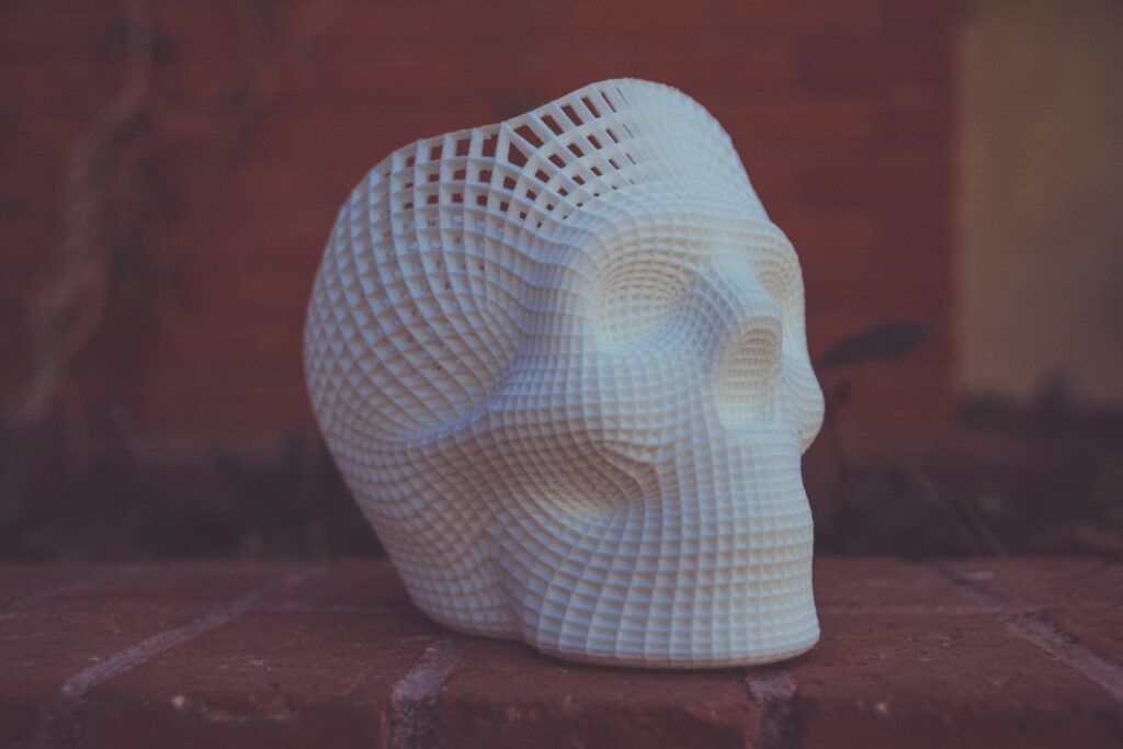 3d printed cosplay helmet showing a sanded and primed prop ready for painting representing the finishing process for 3d printed costume pieces