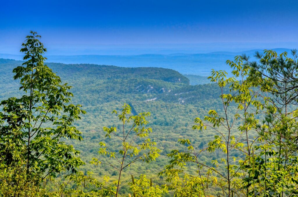 minnewaska state park showing lake surrounded by white cliffs and pine trees representing minnewaska state park minnewaska state park preserve lake minnewaska state park waterfall and hiking minnewaska state park