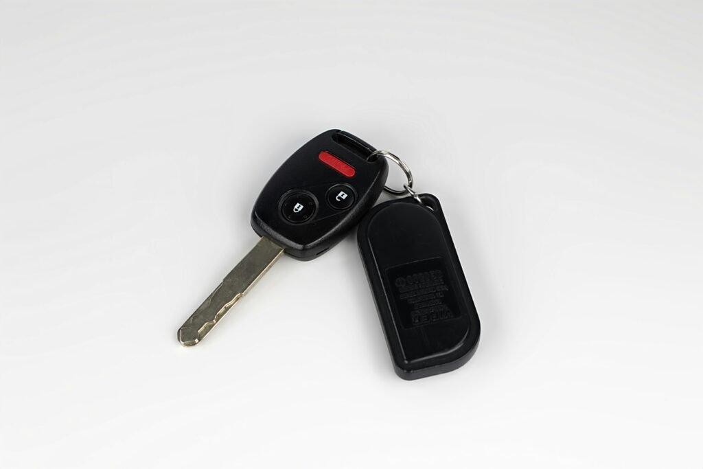 Car key fob battery replacement guide showing CR2032 battery and key fob representing subaru key fob battery honda key fob battery how to change battery key fob toyota nissan ford key fob battery replacement guide